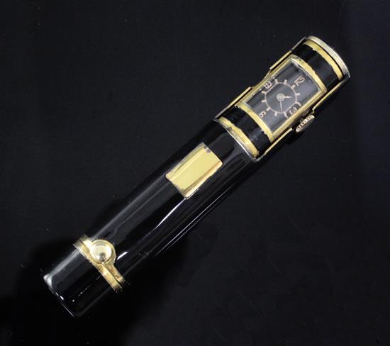 A gilded black enamel combination lipstick holder/watch, 7cm.